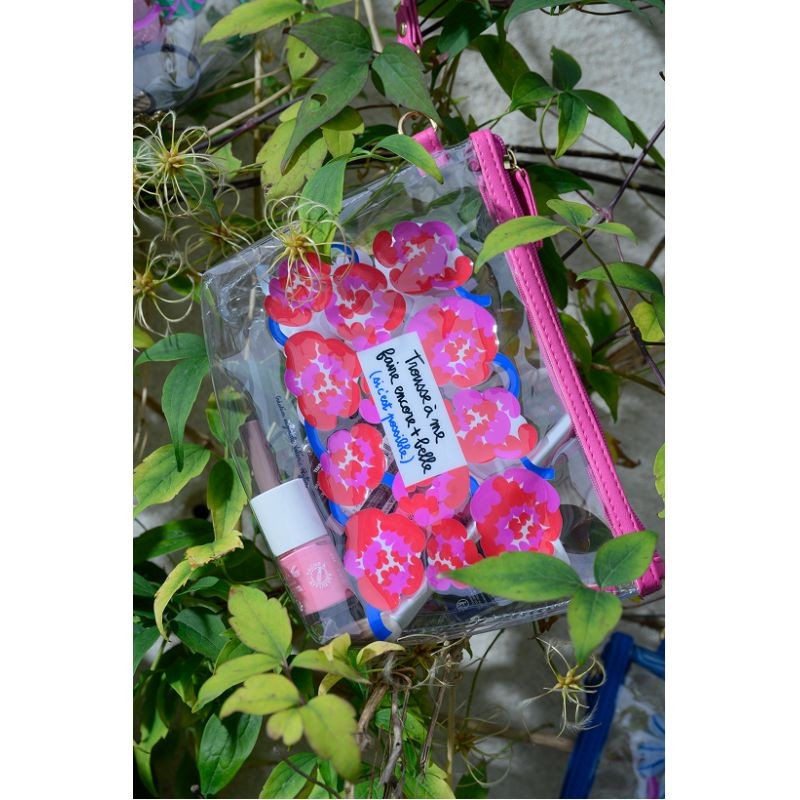 Trousse trasparente e impermeabile con chiusura zip, decorata con fiori fucsia